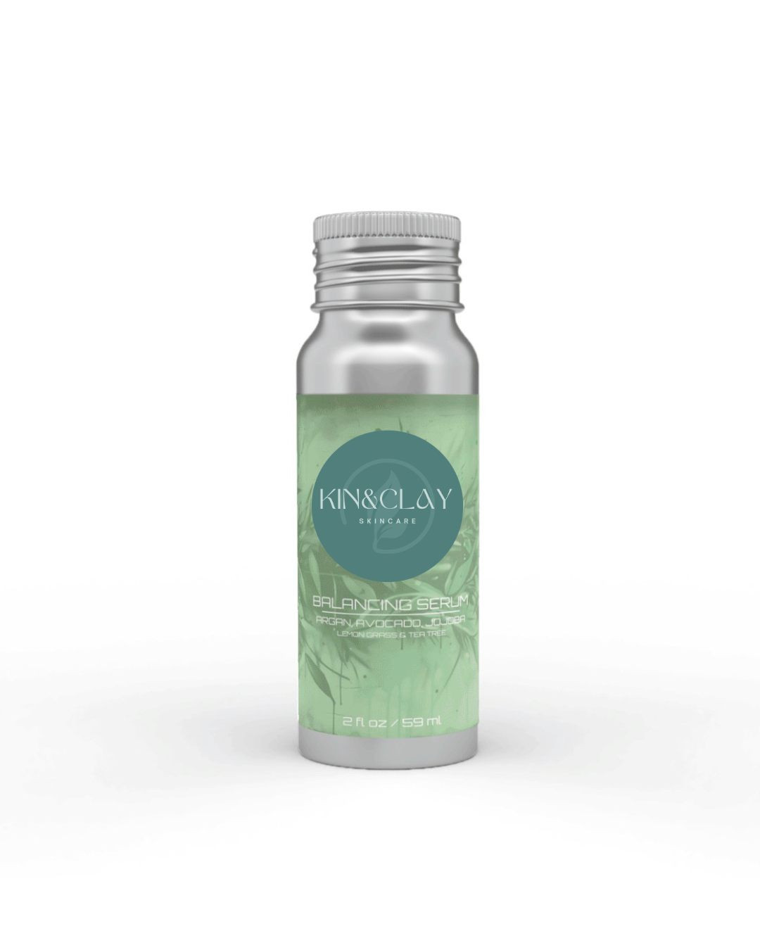 Aluminum bottle of Kin & Clay Balancing Serum with a green leaf-pattern label, 2 fl oz / 59 ml
